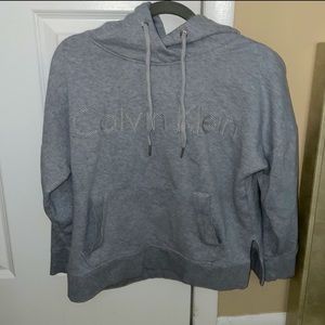 Calvin Klein logo drawstring pullover hoodie with side slits + high/low design